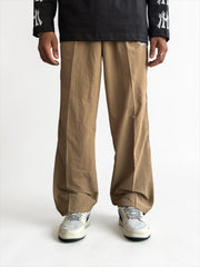 Premium straight-fit track pants for a clean, modern look. A3 Brown with brown strap