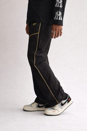 Premium straight-fit track pants for a clean, modern look. A2 Black with yellow