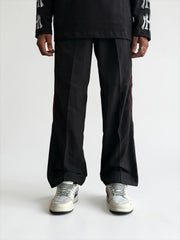 Premium straight-fit track pants for a clean, modern look. A3 Black with red line