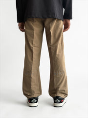 Premium straight-fit track pants for a clean, modern look. A3 Brown with brown strap