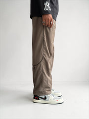 Premium straight-fit track pants for a clean, modern look. A3 Brown with black strap