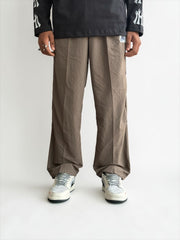 Premium straight-fit track pants for a clean, modern look. A3 Brown with black strap