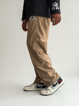 Premium straight-fit track pants for a clean, modern look. A3 Brown with brown strap
